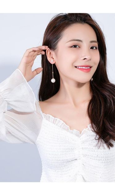 耳饰怎么搭配显气质_适合圆脸的长耳饰推荐